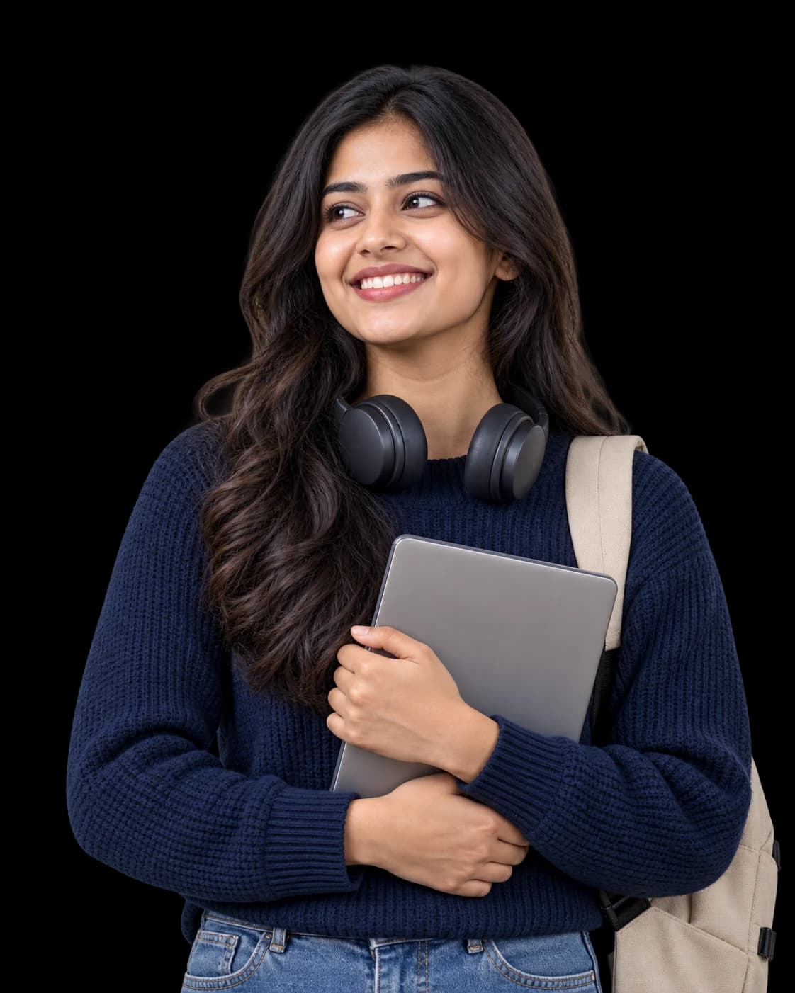 A smiling student holding a tablet